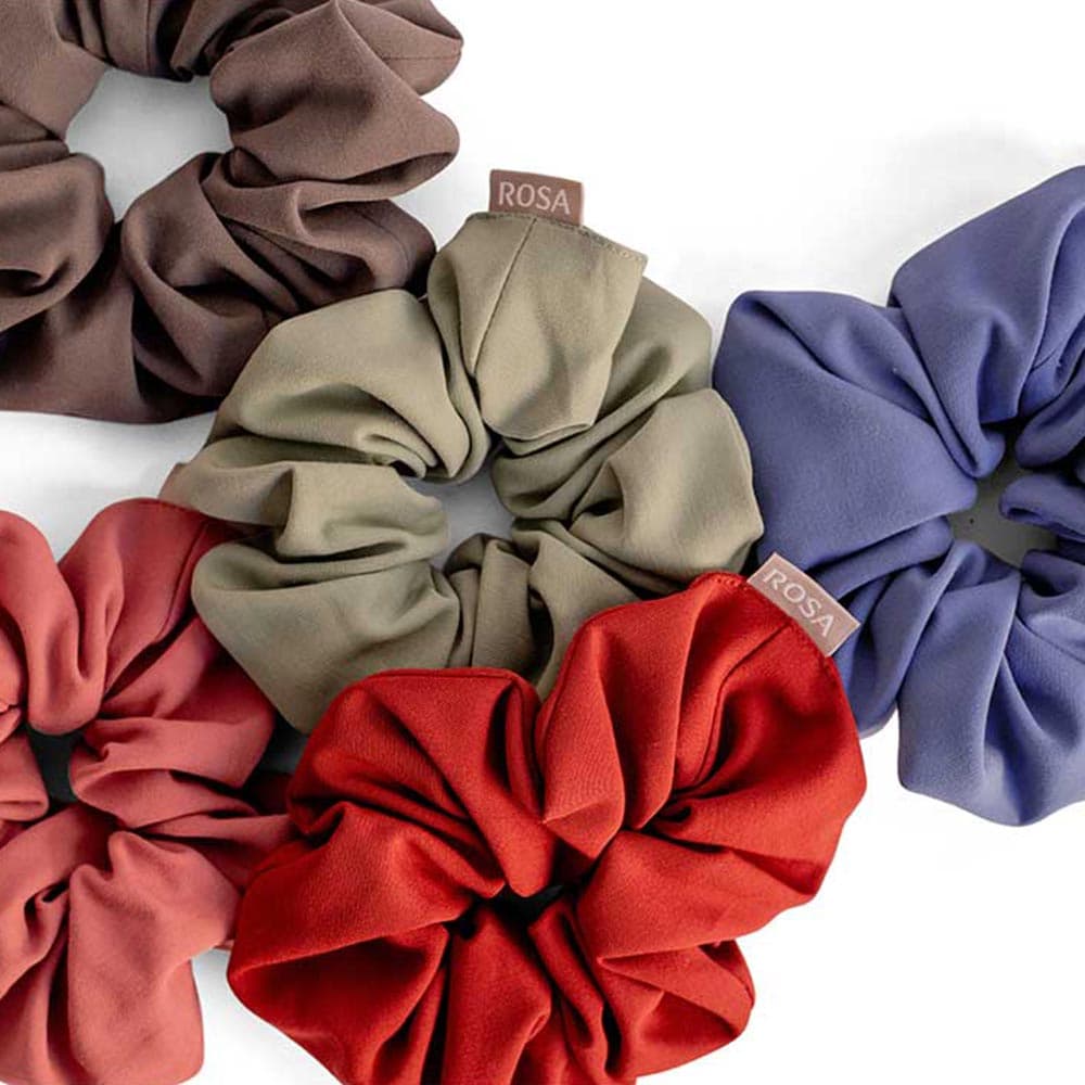 Hair scrunchies in all five launch colours